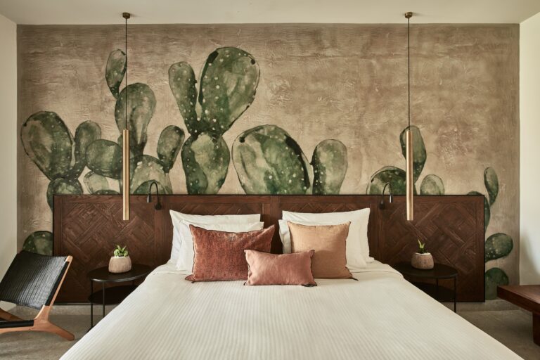 Stylish and eco-inspired bedroom at Cretan Malia Park, featuring earthy tones, cactus-themed wall art, and minimalist decor. Stylish and eco-inspired bedroom at Cretan Malia Park, featuring earthy tones, cactus-themed wall art, and minimalist decor.