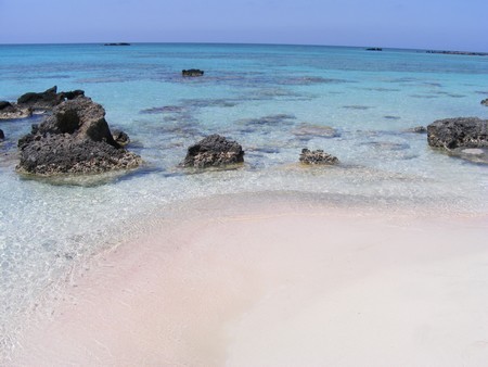 Pink sand by the sea