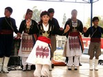 Young children dancing on Chania Town Square