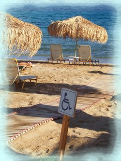 disability access sign on a beach