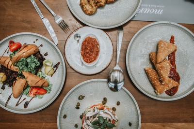 A beautifully presented selection of Cretan dishes at Mourelo restaurant, featuring fresh ingredients and traditional flavours. A beautifully presented selection of Cretan dishes at Mourelo restaurant, featuring fresh ingredients and traditional flavours.