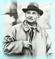A black-and-white photograph of Sir Arthur Evans, the renowned British archaeologist who led the excavation of the Palace of Knossos in Crete. He is wearing a hat and a trench coat, with one hand tucked inside the coat, and has a thoughtful expression on his face.