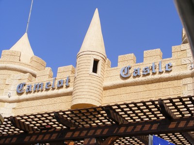 Nightlife, showing the Camelot Castle in Malia during the day