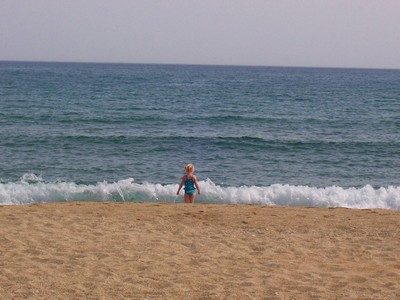 Child having fun on the beach