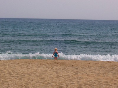 Child having fun on the beach