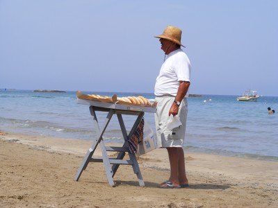 Donut seller on Stalis beach